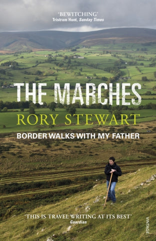 The Marches : Border walks with my father by Rory Stewart. Book cover has a photograph of the author on a hillside in a rural landscape, with a ridge of hills in the distance.