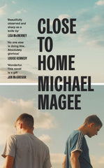 Close to Home by Michael Magee. Book cover has a colour photograph of two young men in t-shirts with a blue cloudy sky behind them.
