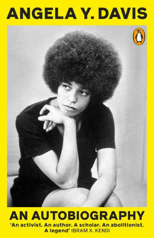 An Autobiography by Angela Y. Davis. Book cover has a black and white photograph of the author sitting down.