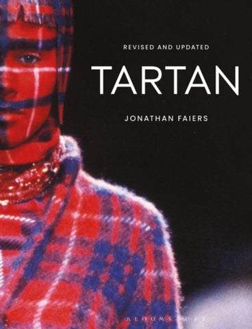 Tartan : Revised and Updated by Professor Jonathan Faiers. Book coevr has a photograph of a woman dressed in tartan, with the same tartan design superimposed on her face.