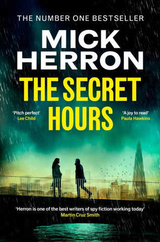 The Secret Hours by Mick Herron. Book cover has a photograph of a woman and man meeting on a bridge in a rainy London, with the shard in the background.