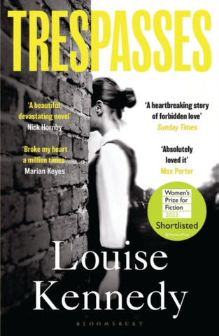 Trespasses by Louise Kennedy. Book cover has a black and white photograph of a young woman walking around a brick wall.