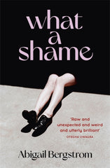 What a Shame by Abigail Bergstrom. Book cover has a photograph of a woman's legs in black shoes with the rest of her body obscured by a black shadow.