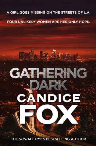 Gathering Dark by Candice Fox. Book cover has a panoramic photograph of a city at sunset.