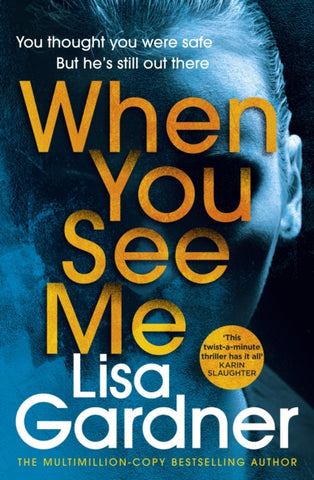 When You See Me by Lisa Gardner. Book has a blue photograph of a person's face on a black background.