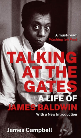 Talking at the Gates : A Life of James Baldwin by James Campbell. Book cover has a black and white photograph of James Baldwin sitting down, smoking a cigarette.