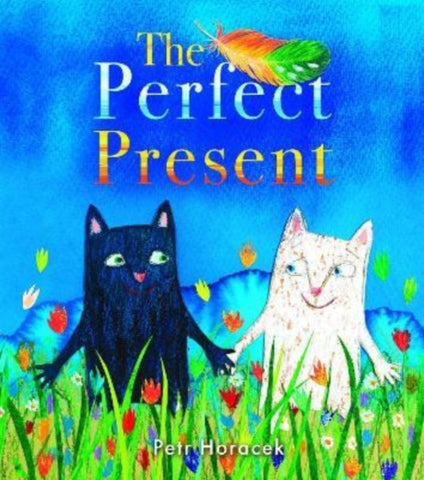 The Perfect Present by Petr Horacek. Book cover has an illustration of a black cat and white cat holding paws in a flower meadow, with a multi-coloured feather floating in the air above them.